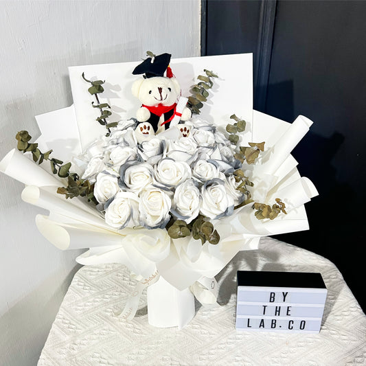 Graduation Bear with Soap Roses Bouquet in White Wrapper - Aurora Grey Roses